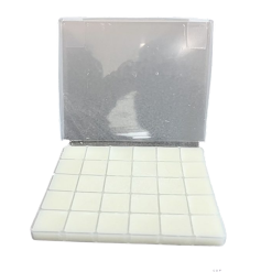 A sealed container holding white ketamine troches, a solid research chemical for laboratory use.